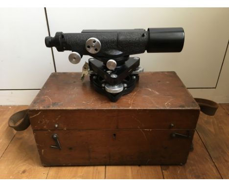 A Hilger &amp; Watts No. 67738 surveyors level in wooden box with leather strap.