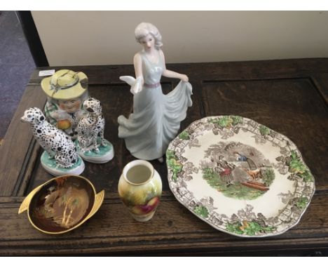 A pair of Staffordshire dalmations with a tobacco jar in the form of a man with hat, AF, with a small Royal Worcester vase, C