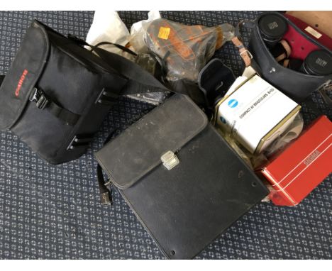 Various cameras including Canon, Sigma, etc, with Minolta and Hoys binoculars.
