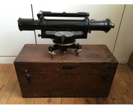 A Cookes &amp; Sons No. 12175 surveyors level, marked No. 5497 1894, in wooden box, together with a mahognay tripod.&nbsp;