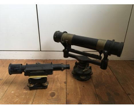 An A.C. Thornton Manchester surveyors level with smaller surveyors level, together with a mahogany cylinder tripod&nbsp;