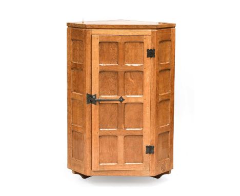 Squirrelman: Wilfrid Hutchinson (Husthwaite): A Panelled Oak Hanging Corner Cupboard, with wrought iron hinges and latch, ope