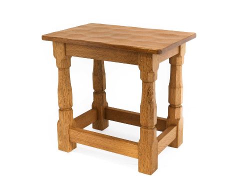 Workshop of Robert Mouseman Thompson (Kilburn): An English Oak Solid Top Stool, on four octagonal legs joined by stretchers, 