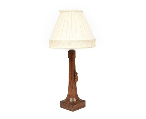 Robert Mouseman Thompson (1876-1955): An English Oak Table Lamp, octagonal column on a square base, with carved mouse tradema