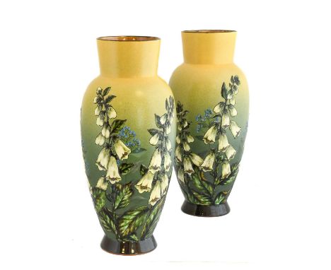 A Pair of Linthorpe Pottery Vases, shape No.477, painted by Alec Burns, with foxgloves, in shades of white, green, blue and y