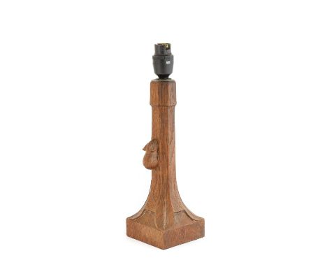 Robert Mouseman Thompson (1876-1955): An English Oak Table Lamp, octagonal column on a square base, with carved mouse tradema