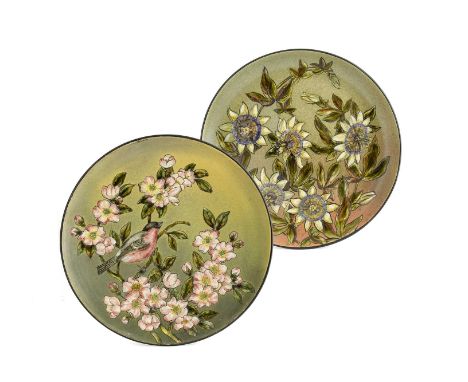 Two Linthorpe Pottery Chargers, shape No.299, by Rachel Smith and William Sheldon, painted with passion flowers and a bird in