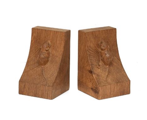 Workshop of Robert Mouseman Thompson (Kilburn): A Pair of English Oak Single Mouse Bookends, each with carved mouse trademark