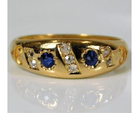 An 18ct diamond &amp; sapphire ring 4.2g size N/O