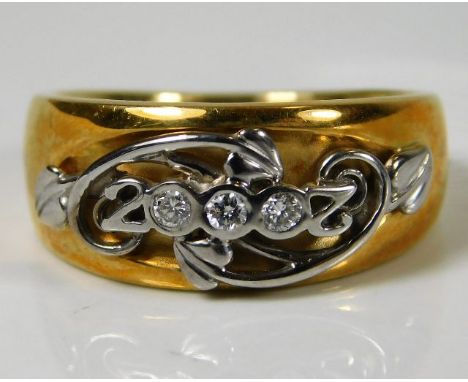 An 18ct two colour Welsh Clogau gold Year 2000 millennium ring set with approx. 0.15ct diamond 10.4g size Q/R 