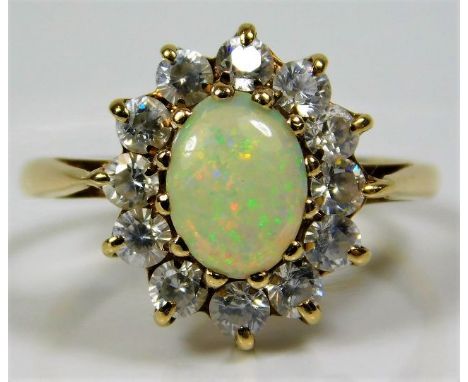 A 9ct gold ring set with opal style stone &amp; paste 2.9g size N 