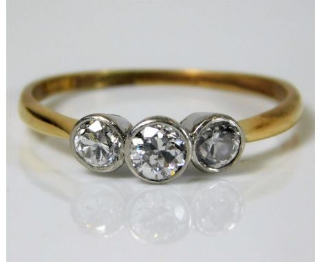 An 18ct gold ring set with approx. 0.6ct diamonds 2.5g size S