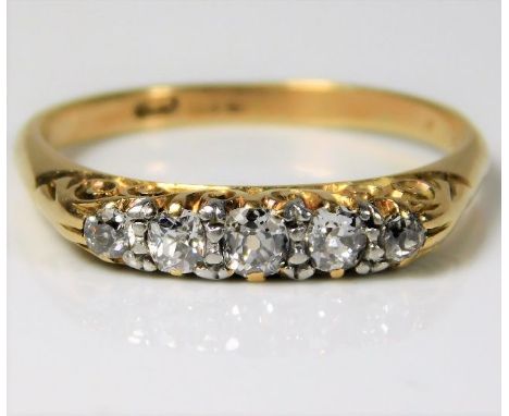 An antique 18ct gold ring set with approx. 0.33ct diamonds 3.1g size P/Q