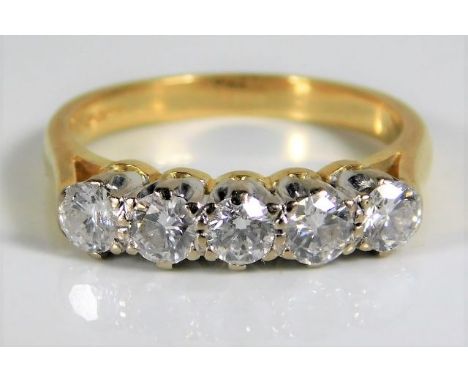 An 18ct gold ring set with approx. 0.82ct diamonds 4.2g size O/P