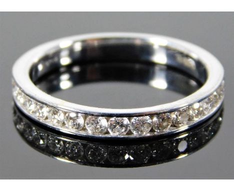 A 9ct white gold half eternity ring set with approx. 1ct diamond 2.6g size O/P