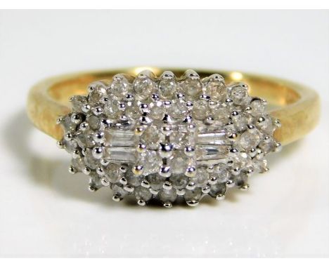 A 9ct gold ring set with 0.5ct diamonds 4g size P