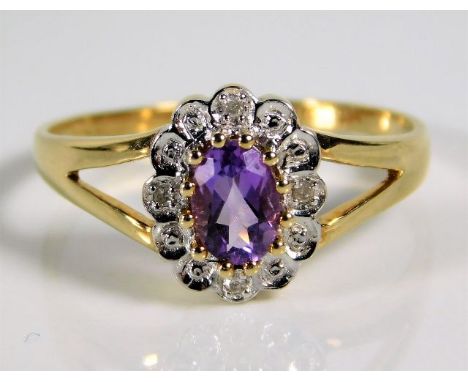 A 9ct gold ring set with amethyst &amp; diamond 2.1g size Q/R