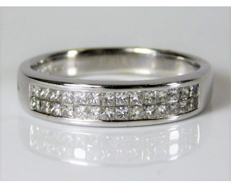 An 18ct white gold half eternity ring set with approx. 0.5ct diamonds 5.2g size P/Q