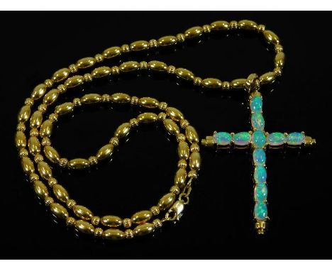 A14ct gold opal cross with 14ct gold necklace 27g