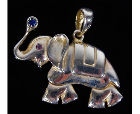 A yellow metal elephant pendant set with sapphire &amp; ruby, tests as 14ct gold 37mm long 8.5g
