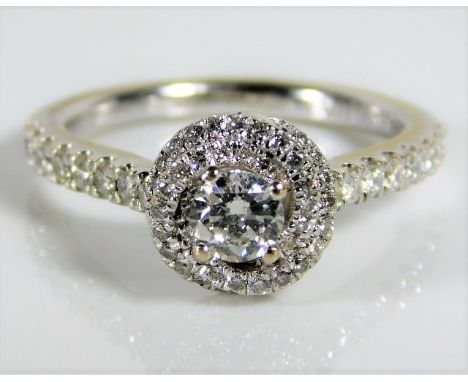 An 18ct white gold Vera Wang "Love Ring" ring set with 0.7ct diamonds 4.8g size M/N