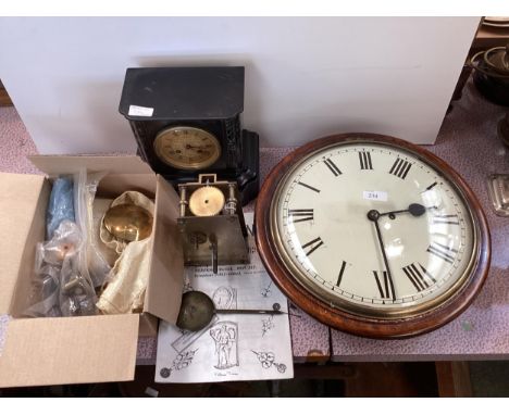 Black late mantel clock; and a clock works movement; and a pamphlet on clock hands, all as found; Fawley Manor Clearance.. PL
