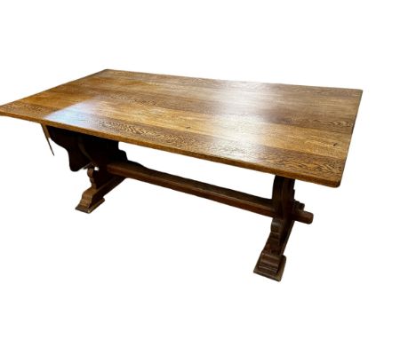 A light oak refectory table 182cm Long x 75cmH x 91cm W 