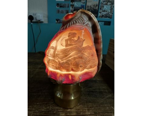 A carved cameo/conch shell with PAT tested light fitting, working with cert 
