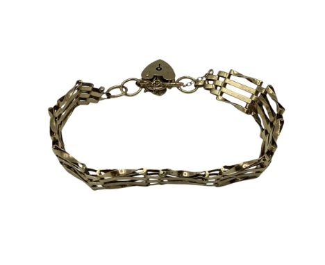 A 9ct gold gate link bracelet with 9ct gold heart locket, 10.3 g 