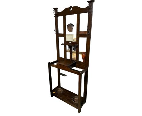 Four pieces of furniture: An Edwardian tall oak coat and umbrella stand, an oak corner hanging cabinet, a mahogany corner cab