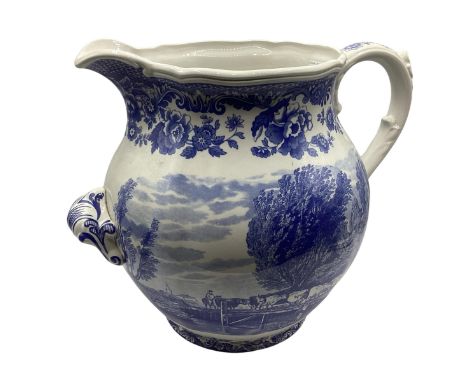 An oversized blue and white Spode jug, marked to base, " The signature collection, "Rural Scenes" number 180, 2001 edition, v