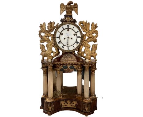 An Austrian Biedermeier style  "portico" clock with later French Movement, and later star holes to the centre to cover the or