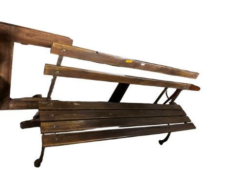 A slatted part wooden bench 151cm L 