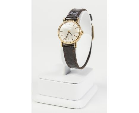 LADY'S TISSOT GOLD PLATED WRIST WATCH, with mechanical movement, circular silvered dial with batons and TISSOT MOCK CROCODILE