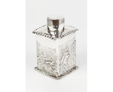 A LATE VICTORIAN SILVER TEA CANISTER, embossed with an encircling Medieval hunting scene, Birmingham 1899 