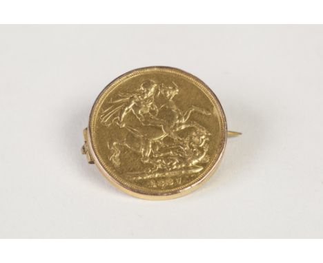 VICTORIAN GOLD SOVEREIGN 1887, with loose gold frame as a brooch,  9.5gms gross 