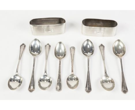 PAIR OF SILVER ENGINE TURNED NAPKIN RINGS, oval and straight sided, initialled 'R', SET OF SIX SILVER TEASPOONS, Birmingham 1