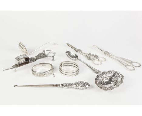 A PAIR OF EARLY VICTORIAN CLOSE PLATE CANDLE SNUFFERS  by T. Jordan, Sheffield two pairs of plated GRAPE SCISSORS, a probably