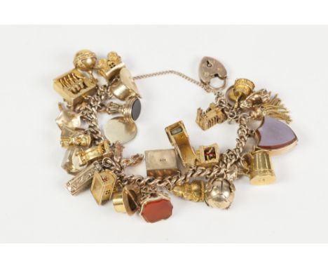 9ct GOLD CURB PATTERN CHARM BRACELET, with 9ct gold padlock clasp and thirty 9ct gold charms including; a Victorian gold and 