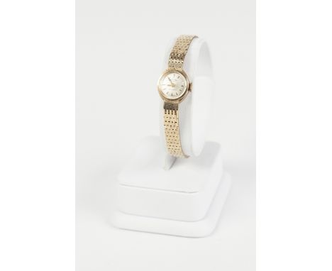 LADY'S ROTARY 9ct GOLD BRACELET WATCH, with 21 jewel movement, small circular dial with batons, integral 9ct gold integral br