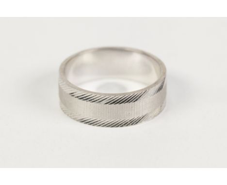 18ct WHITE GOLD BROAD WEDDING RING, engine turned and with engraved borders, London 1969, 6.5gms, ring size Q/R