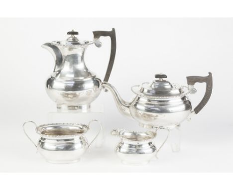 GEORGIAN STYLE SILVER TEA SERVICE OF FOUR PIECES, of bulbous rounded oblong form with egg and dart borders on a plain pedesta