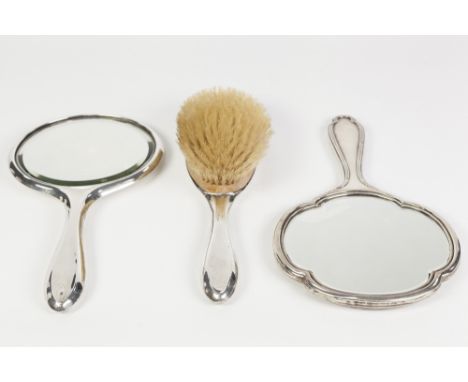GEORGE V SILVER BACKED DRESING TABLE HAND MIRROR AND MATCHING HAIR BRUSH, Chester 1915, together with an ENGINE TURNED SILVER