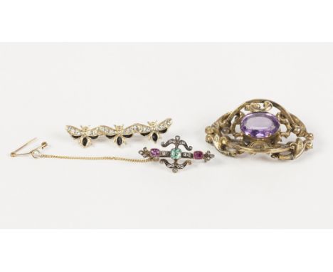 VICTORIAN ROLLED GOLD OVAL BROOCH, of openwork scroll pattern set with centre amethyst coloured stone, 1 3/4" wide; A VICTORI