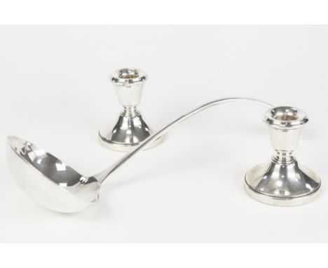 A PAIR OF POST-WAR WEIGHTED SILVER DWARF CANDLESTICKS, Birmingham 1973, also an EPNS. SOUP LADLE (3) 