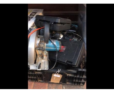 A plastic tray including useful electric tools including circular saw