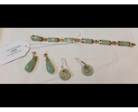 A gold and jade bracelet with matching earrings, together with one other pair of jade earringsCONDITION REPORTBy our judgemen