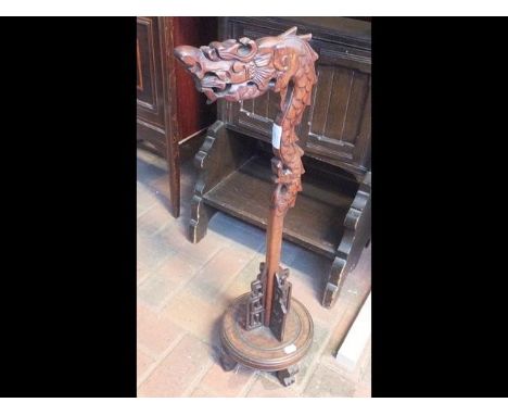 A Chinese hardwood lamp stand - height 72cms