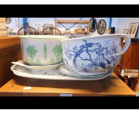 Antique chamber pots together with other ceramic ware