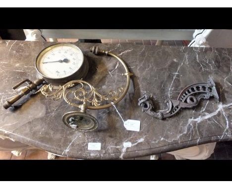 An elegant brass light wall fitment and one other together with a pressure gauge 